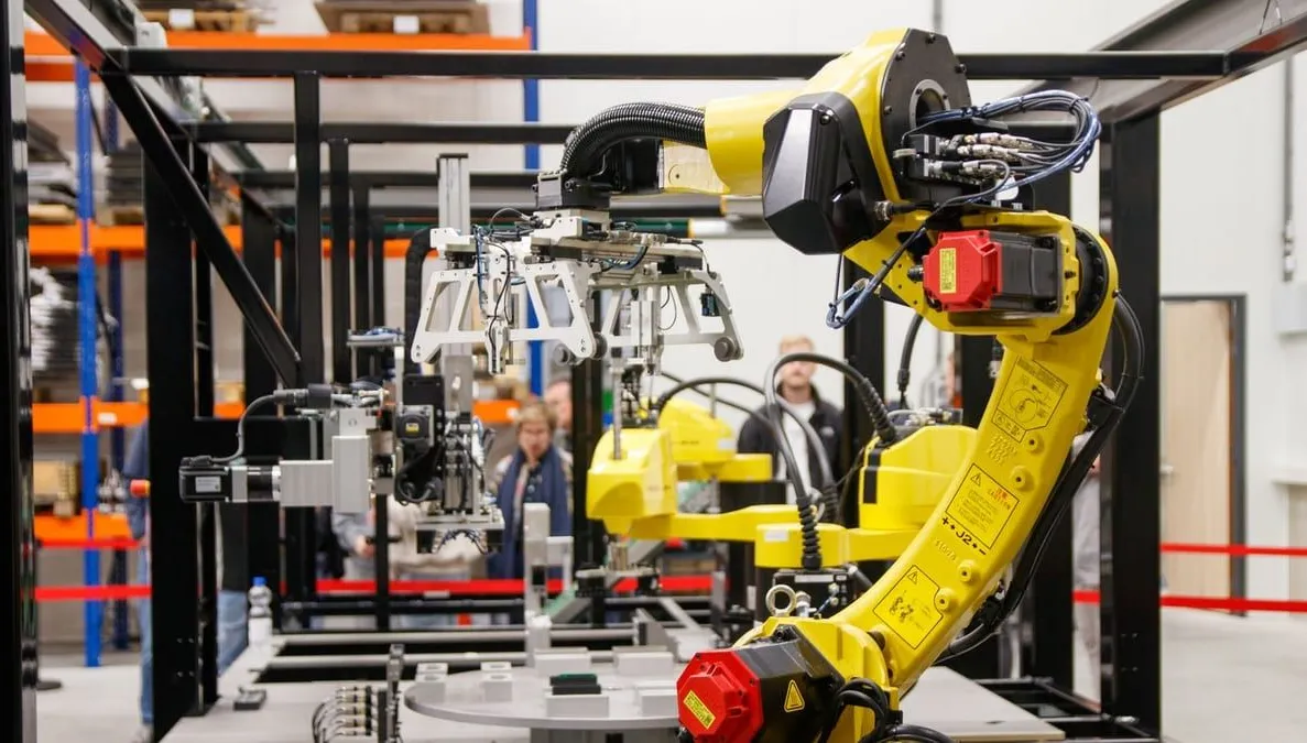 Robotic arm welding on an automotive production line