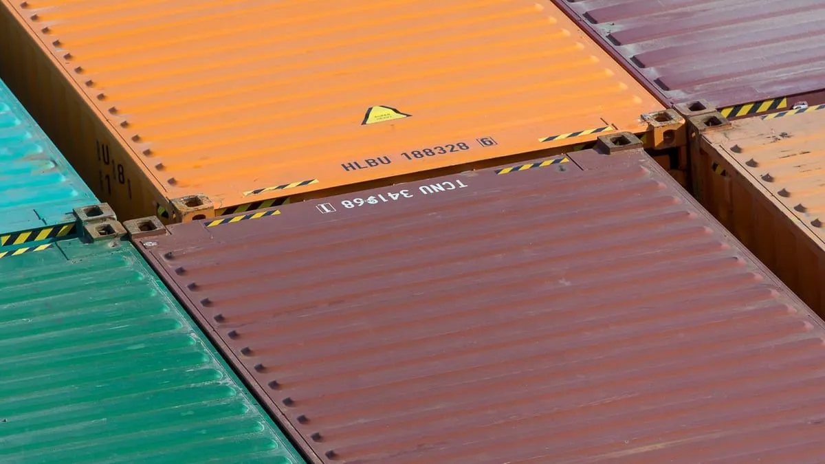 Steel shipping container panels at a repair yard