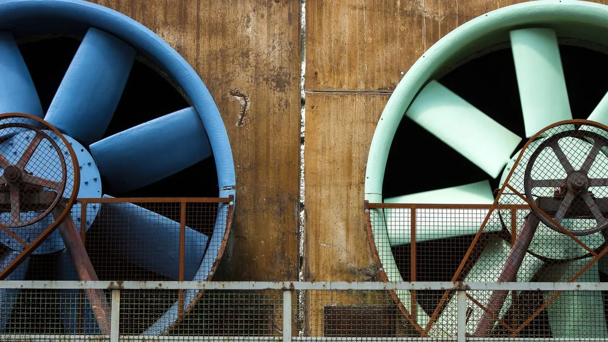 Large industrial ventilation fans in a plant room