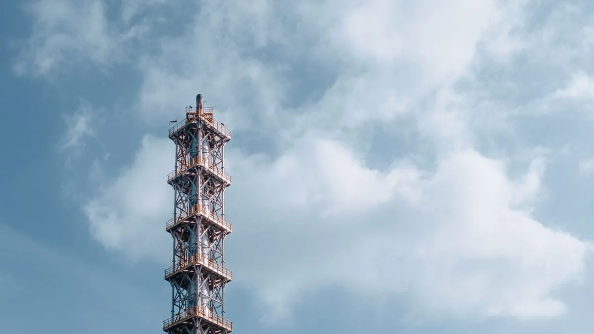 Oil and gas drilling rig against open sky